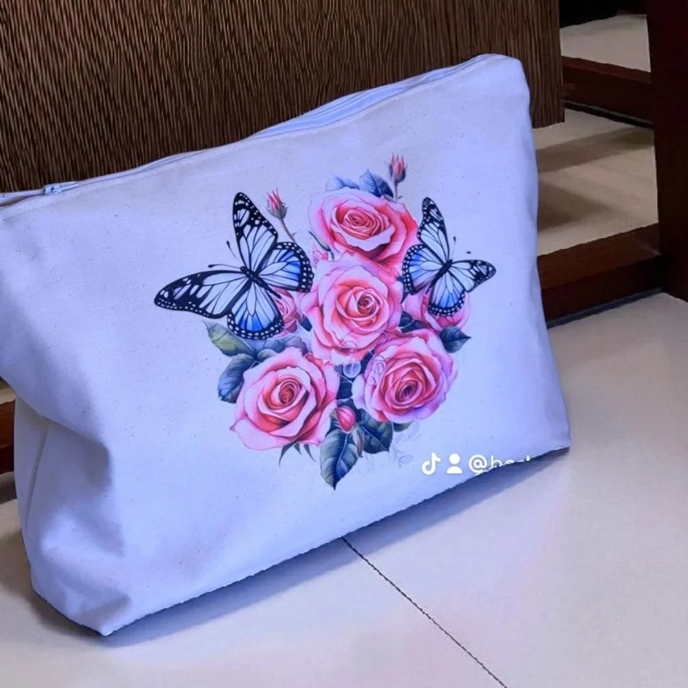 Chic White Cosmetic Bag with Floral and Butterfly Design